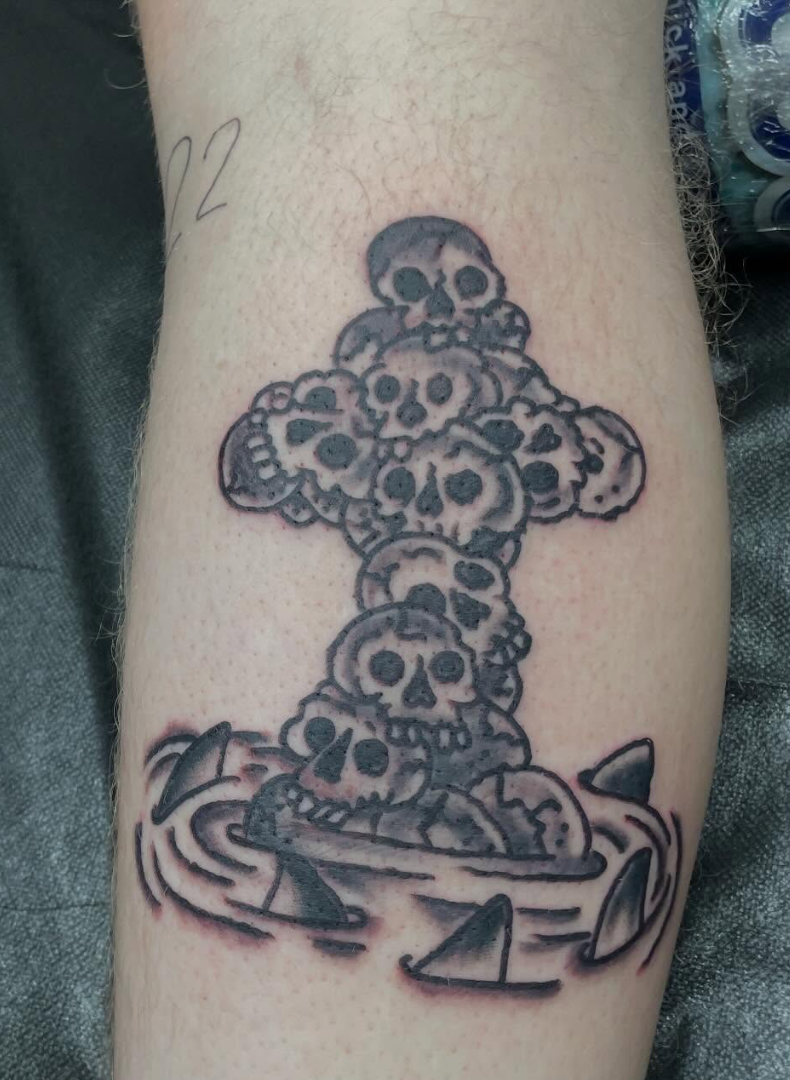 Traditional skull cross tattoo with sharks, black and grey, Historic Tattoo Studio